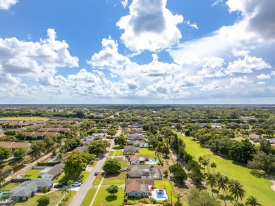 Your home search ends here in the highly desirable Palm Beach on Palm Beach National Golf and Country Club in Florida - for sale on GolfHomes.com, golf home, golf lot