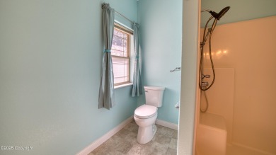 Beautifully maintained 4 bed, 3 bath custom home with 2,624 sq on The Golf Club At Devils Tower in Wyoming - for sale on GolfHomes.com, golf home, golf lot