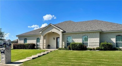 Welcome to this stunning custom home in the exclusive North on The Lake Country Club - Lake Waco in Texas - for sale on GolfHomes.com, golf home, golf lot