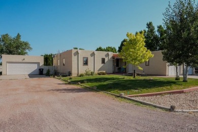 Welcome to this beautiful and UNIQUE  rancher. The  property is on Desert Hawk At Pueblo West in Colorado - for sale on GolfHomes.com, golf home, golf lot