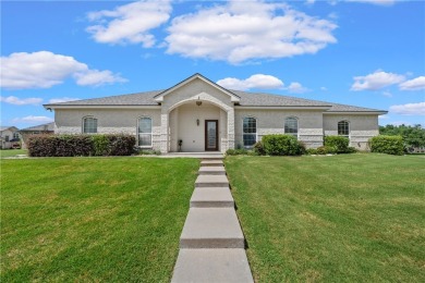 Welcome to this stunning custom home in the exclusive North on The Lake Country Club - Lake Waco in Texas - for sale on GolfHomes.com, golf home, golf lot