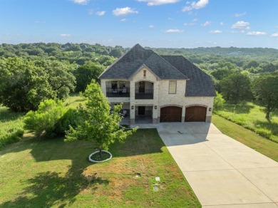 Discover Lakeside Luxury in this stunning custom residence on White Bluff Resort - Old Course in Texas - for sale on GolfHomes.com, golf home, golf lot