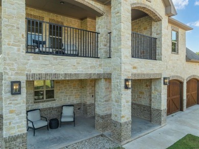Discover Lakeside Luxury in this stunning custom residence on White Bluff Resort - Old Course in Texas - for sale on GolfHomes.com, golf home, golf lot