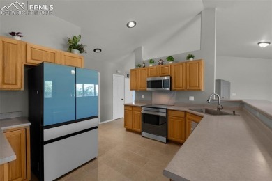 Freshly painted inside and out, this beautiful 5-bedroom on Antler Creek Golf Course in Colorado - for sale on GolfHomes.com, golf home, golf lot