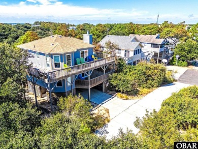 Fall in! Sitting well elevated in an X flood zone, Sunny Days is on The Currituck Golf Club in North Carolina - for sale on GolfHomes.com, golf home, golf lot