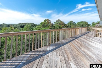 Fall in! Sitting well elevated in an X flood zone, Sunny Days is on The Currituck Golf Club in North Carolina - for sale on GolfHomes.com, golf home, golf lot