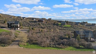 Nestled in the scenic community of Bear Lake West, this stunning on Bear Lake West Golf and Country Club in Idaho - for sale on GolfHomes.com, golf home, golf lot