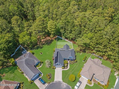 Looking for a beautifully remodeled home in the heart of on Meadowlands Golf Club in North Carolina - for sale on GolfHomes.com, golf home, golf lot