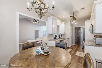 Looking for a beautifully remodeled home in the heart of on Meadowlands Golf Club in North Carolina - for sale on GolfHomes.com, golf home, golf lot