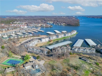 This Condo is a Lifestyle Built Around the Lake of the Ozarks! on Seasons Ridge At Four Seasons in Missouri - for sale on GolfHomes.com, golf home, golf lot