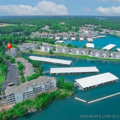 This Condo is a Lifestyle Built Around the Lake of the Ozarks! on Seasons Ridge At Four Seasons in Missouri - for sale on GolfHomes.com, golf home, golf lot