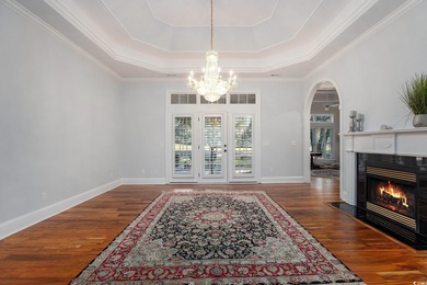 Discover 423 Chapman Loop, a beautifully maintained traditional on Willbrook Plantation Golf Club in South Carolina - for sale on GolfHomes.com, golf home, golf lot