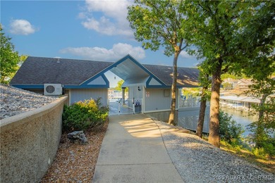 This Condo is a Lifestyle Built Around the Lake of the Ozarks! on Seasons Ridge At Four Seasons in Missouri - for sale on GolfHomes.com, golf home, golf lot