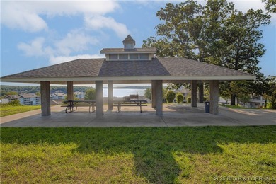 This Condo is a Lifestyle Built Around the Lake of the Ozarks! on Seasons Ridge At Four Seasons in Missouri - for sale on GolfHomes.com, golf home, golf lot