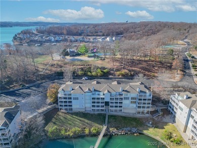This Condo is a Lifestyle Built Around the Lake of the Ozarks! on Seasons Ridge At Four Seasons in Missouri - for sale on GolfHomes.com, golf home, golf lot