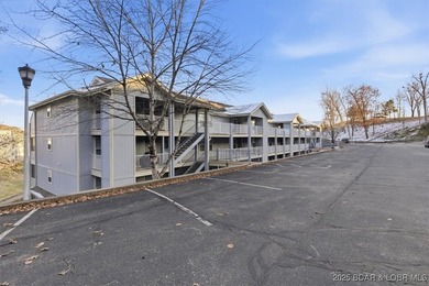 This Condo is a Lifestyle Built Around the Lake of the Ozarks! on Seasons Ridge At Four Seasons in Missouri - for sale on GolfHomes.com, golf home, golf lot