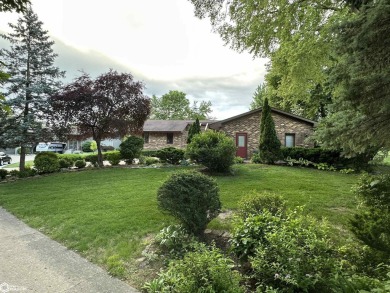Nestled in a quiet, wooded neighborhood between Sunnyside Park & on Burlington Golf Club in Iowa - for sale on GolfHomes.com, golf home, golf lot