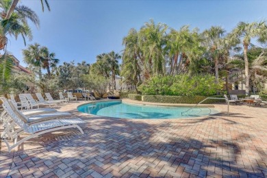This rare 2 bedroom-3 bedroom, 3 bathroom multi-level townhome on Pasadena Yacht and Country Club in Florida - for sale on GolfHomes.com, golf home, golf lot