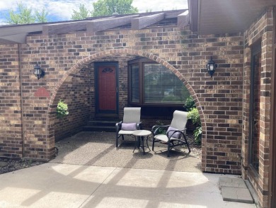 Nestled in a quiet, wooded neighborhood between Sunnyside Park & on Burlington Golf Club in Iowa - for sale on GolfHomes.com, golf home, golf lot
