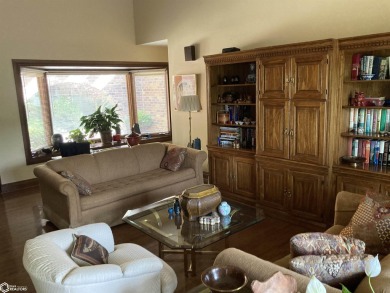 Nestled in a quiet, wooded neighborhood between Sunnyside Park & on Burlington Golf Club in Iowa - for sale on GolfHomes.com, golf home, golf lot