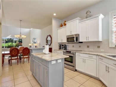 This stunning Pelican Marsh pool home is located in the sought on  in Florida - for sale on GolfHomes.com, golf home, golf lot