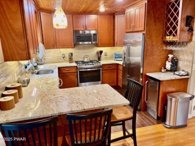 Immaculate move-in ready home in one of Lake Wallenpaupack's on Paupack Hills Golf and Country Club in Pennsylvania - for sale on GolfHomes.com, golf home, golf lot