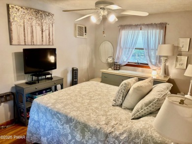 Immaculate move-in ready home in one of Lake Wallenpaupack's on Paupack Hills Golf and Country Club in Pennsylvania - for sale on GolfHomes.com, golf home, golf lot
