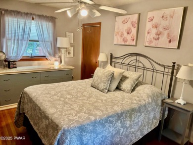Immaculate move-in ready home in one of Lake Wallenpaupack's on Paupack Hills Golf and Country Club in Pennsylvania - for sale on GolfHomes.com, golf home, golf lot