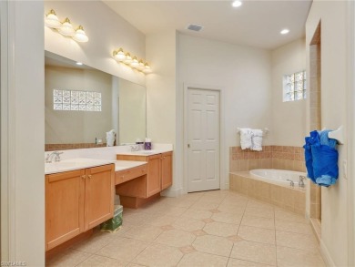 This stunning Pelican Marsh pool home is located in the sought on  in Florida - for sale on GolfHomes.com, golf home, golf lot