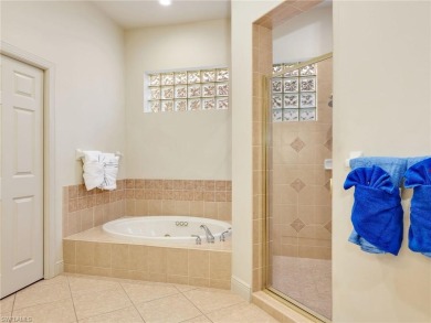 This stunning Pelican Marsh pool home is located in the sought on  in Florida - for sale on GolfHomes.com, golf home, golf lot