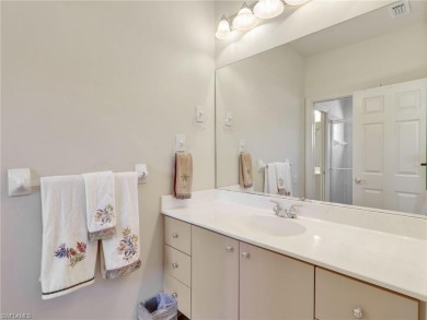 This stunning Pelican Marsh pool home is located in the sought on  in Florida - for sale on GolfHomes.com, golf home, golf lot