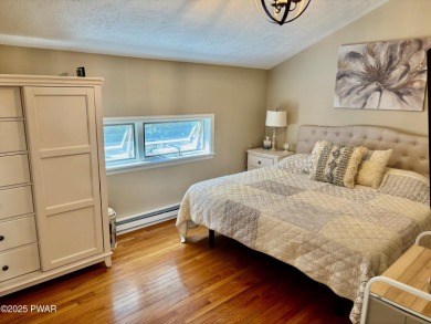 Immaculate move-in ready home in one of Lake Wallenpaupack's on Paupack Hills Golf and Country Club in Pennsylvania - for sale on GolfHomes.com, golf home, golf lot