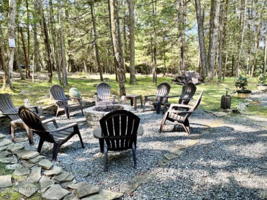 Immaculate move-in ready home in one of Lake Wallenpaupack's on Paupack Hills Golf and Country Club in Pennsylvania - for sale on GolfHomes.com, golf home, golf lot