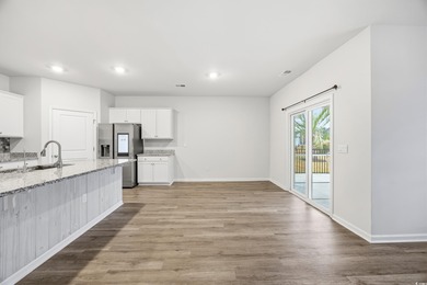 Step into this meticulously maintained 4-bedroom, 2-bath home on Palmetto Greens Golf and Country Club in South Carolina - for sale on GolfHomes.com, golf home, golf lot