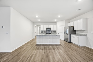 Step into this meticulously maintained 4-bedroom, 2-bath home on Palmetto Greens Golf and Country Club in South Carolina - for sale on GolfHomes.com, golf home, golf lot