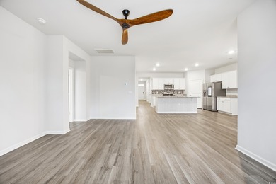 Step into this meticulously maintained 4-bedroom, 2-bath home on Palmetto Greens Golf and Country Club in South Carolina - for sale on GolfHomes.com, golf home, golf lot