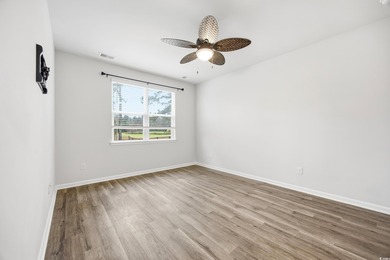 Step into this meticulously maintained 4-bedroom, 2-bath home on Palmetto Greens Golf and Country Club in South Carolina - for sale on GolfHomes.com, golf home, golf lot