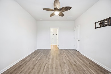 Step into this meticulously maintained 4-bedroom, 2-bath home on Palmetto Greens Golf and Country Club in South Carolina - for sale on GolfHomes.com, golf home, golf lot