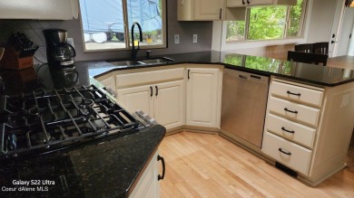Totally remodeled & updated 2,840 SF 4 bed, 2.5 bath home on .38 on Ponderosa Springs Golf Course in Idaho - for sale on GolfHomes.com, golf home, golf lot