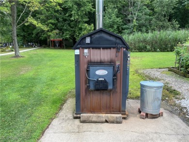 Welcome to your secluded oasis! This unique property is zoned on Hickory Nut Golf Club in Ohio - for sale on GolfHomes.com, golf home, golf lot