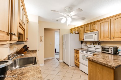 Classic Carolina Shores subdivision split three bedroom floor on Carolina Shores Golf Course in North Carolina - for sale on GolfHomes.com, golf home, golf lot