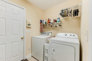 Classic Carolina Shores subdivision split three bedroom floor on Carolina Shores Golf Course in North Carolina - for sale on GolfHomes.com, golf home, golf lot