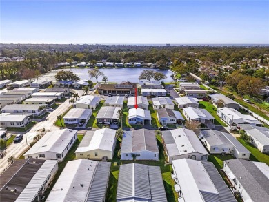 Are you ready for fun, maintenance free living in the 55+ on Largo Golf Course in Florida - for sale on GolfHomes.com, golf home, golf lot