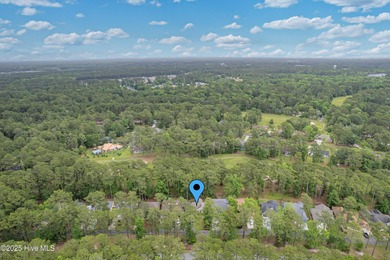 Classic Carolina Shores subdivision split three bedroom floor on Carolina Shores Golf Course in North Carolina - for sale on GolfHomes.com, golf home, golf lot