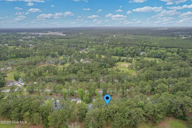 Classic Carolina Shores subdivision split three bedroom floor on Carolina Shores Golf Course in North Carolina - for sale on GolfHomes.com, golf home, golf lot