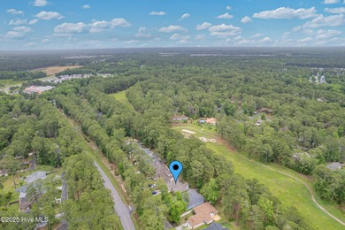 Classic Carolina Shores subdivision split three bedroom floor on Carolina Shores Golf Course in North Carolina - for sale on GolfHomes.com, golf home, golf lot