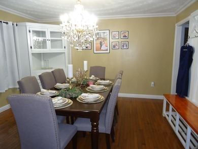 Welcome to this spacious and inviting 4-bedroom, 2.5-bath home on Paintsville Country Club in Kentucky - for sale on GolfHomes.com, golf home, golf lot