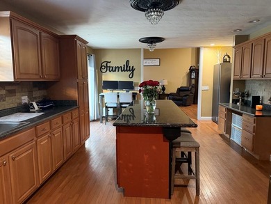 Welcome to this spacious and inviting 4-bedroom, 2.5-bath home on Paintsville Country Club in Kentucky - for sale on GolfHomes.com, golf home, golf lot