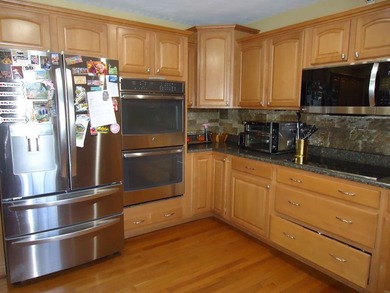 Welcome to this spacious and inviting 4-bedroom, 2.5-bath home on Paintsville Country Club in Kentucky - for sale on GolfHomes.com, golf home, golf lot