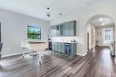 Luxurious Living in Greyhawk at Golf Club of the Everglades on Calusa Pines Golf Club in Florida - for sale on GolfHomes.com, golf home, golf lot